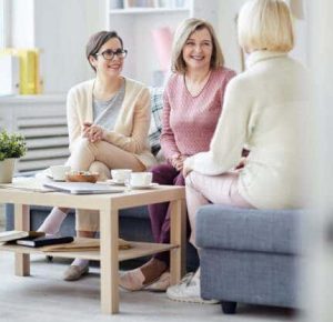 cheerful-women-chatting-PA8KTYC2-1.jpg